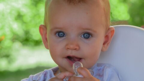 baby girl with pacifier